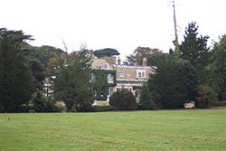 Farringford, now a hotel but was at one time the home of Alfred Lord Tennyson, the poet.” hspace=