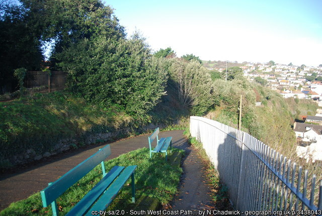 South West Coast Path as it leads down into Dawlish The seats look inviting! 